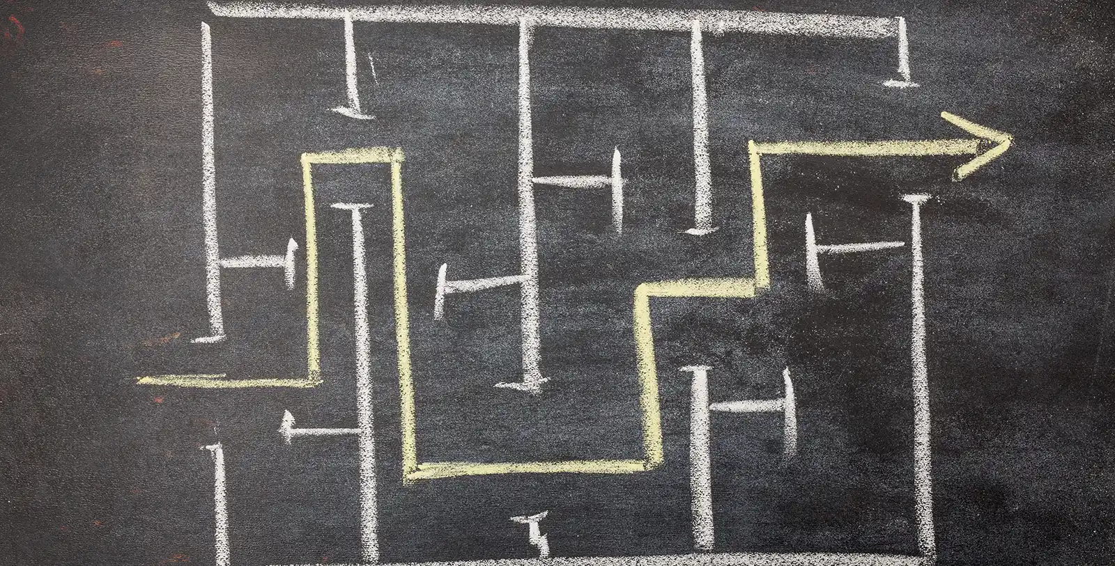 a labyrinth on a blackboard, develop an exit strategy before investing in properties