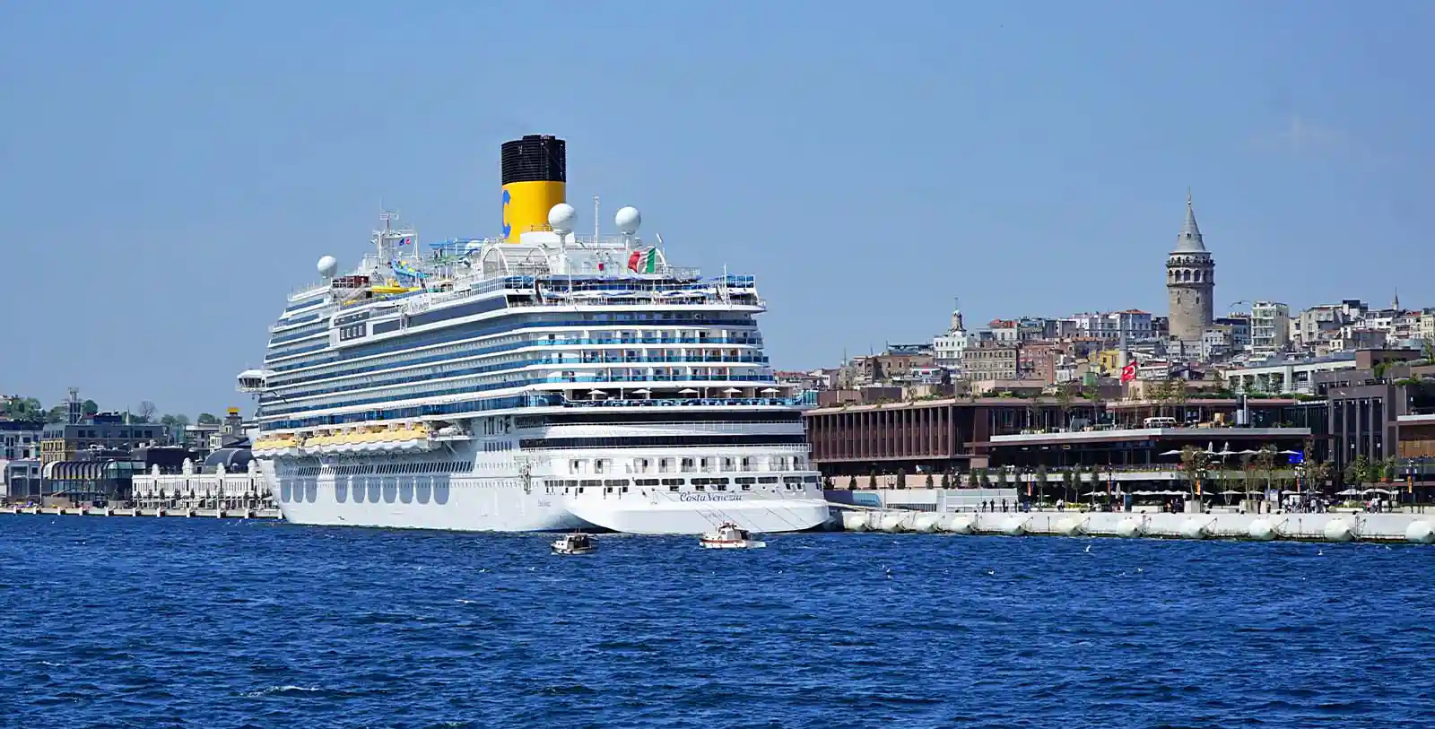 Istanbul is reachable from sea: a cruise ship is boarding passengers from Galata Port in Istanbul.