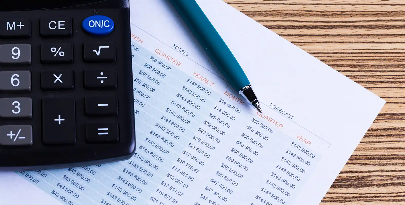 A calculator, calculating the costs before investing in properties.