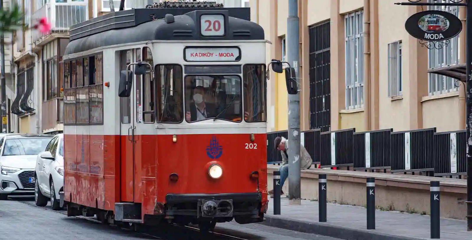 a red nostalgic wagon of Moda tramline in Kadıköy, İstanbul